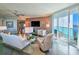 Elegant living space with floor-to-ceiling windows and stylish furnishings at 231 Riverside Dr # 1509-1, Holly Hill, FL 32117