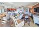 Open-concept living area with gourmet kitchen, perfect for entertaining guests at 231 Riverside Dr # 1509-1, Holly Hill, FL 32117