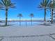 Resort-style pool surrounded by palm trees with views of the intercoastal waterway at 231 Riverside Dr # 1509-1, Holly Hill, FL 32117