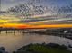 Breathtaking sunset view over the water, showcasing the beautiful landscape and city skyline at 231 Riverside Dr # 1509-1, Holly Hill, FL 32117