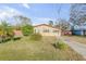 Charming single-story home featuring a well-maintained yard and classic curb appeal at 2323 Queen Palm Dr, Edgewater, FL 32141