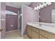 Bathroom featuring a vanity with ample cabinet space and a shower at 234 Meadow Lake Dr, Edgewater, FL 32141