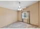 Bedroom featuring a ceiling fan, plush carpet and lots of natural light at 234 Meadow Lake Dr, Edgewater, FL 32141