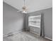 This bedroom features a ceiling fan, carpet and a window that provides great natural light at 234 Meadow Lake Dr, Edgewater, FL 32141
