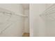 This walk-in closet features ventilated shelving and neutral paint at 234 Meadow Lake Dr, Edgewater, FL 32141