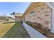 Brick home featuring flower beds and a well-maintained lawn at 234 Meadow Lake Dr, Edgewater, FL 32141