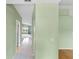 Bright hallway with tile flooring leading to a spacious living area at 234 Meadow Lake Dr, Edgewater, FL 32141