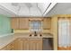Bright kitchen featuring lots of counter space, stainless steel appliances, and tile flooring at 234 Meadow Lake Dr, Edgewater, FL 32141
