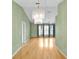 Open concept living space featuring hardwood flooring and lots of natural light at 234 Meadow Lake Dr, Edgewater, FL 32141