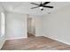 Large open bedroom with wood floors, neutral walls and a ceiling fan at 24 Coquina Point Dr, Ormond Beach, FL 32174