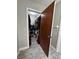 Open closet with shelving, plenty of room, storage baskets, and gray tiled floors at 2404 Victory Palm Dr, Edgewater, FL 32141