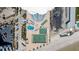 Aerial view of a resort with a pool, sports courts, beach access and lounge areas on the ocean at 2625 S Atlantic Ave # 11Nw, Daytona Beach, FL 32118