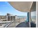 Balcony view of the ocean with blue chair and a balcony railing at 2625 S Atlantic Ave # 11Nw, Daytona Beach, FL 32118