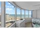 Bright bedroom with large windows providing expansive ocean and beach views at 2625 S Atlantic Ave # 11Nw, Daytona Beach, FL 32118