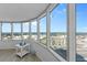 Bedroom with large windows providing expansive city and ocean views at 2625 S Atlantic Ave # 11Nw, Daytona Beach, FL 32118