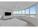 Lovely bright main bedroom with large windows providing beautiful city and ocean views at 2625 S Atlantic Ave # 11Nw, Daytona Beach, FL 32118