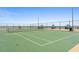 Tennis court features ocean view, creating a unique and inviting atmosphere for sports enthusiasts at 2625 S Atlantic Ave # 11Nw, Daytona Beach, FL 32118