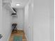 Walk-in closet with shelving, hanging rods and overhead lighting at 2625 S Atlantic Ave # 11Nw, Daytona Beach, FL 32118