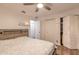 Bright bedroom with ceiling fan, hardwood floors, closet, and neutral walls at 3003 Tamarind Dr, Edgewater, FL 32141
