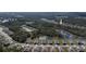 A wide aerial view of the community and surroundings, highlighting the location of the community pool at 301 Sunset Point Dr, Ormond Beach, FL 32174