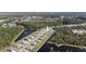 A captivating aerial perspective of the neighborhood, highlighting the pond and meticulously planned layout of the homes at 301 Sunset Point Dr, Ormond Beach, FL 32174