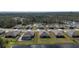 Aerial view of homes, ponds, and wooded areas showcasing the community's layout and natural surroundings at 301 Sunset Point Dr, Ormond Beach, FL 32174