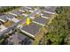 An aerial view of a single-Gathering home on a well-manicured lot in a quiet neighborhood with tree-lined streets at 3029 Adrian Dr, Ormond Beach, FL 32174