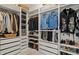 Custom closet with shelving, drawers, and hanging rods for optimal storage at 3029 Adrian Dr, Ormond Beach, FL 32174