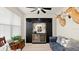 Sitting room featuring hardwood floors, a mini bar, modern ceiling fan, and leather seating at 3029 Adrian Dr, Ormond Beach, FL 32174