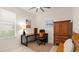 Office space with a dark desk and chair, a wooden cabinet, and a window at 3029 Adrian Dr, Ormond Beach, FL 32174