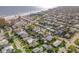 View of a neighborhood with a beach in the background at 308 Normandy Ave, New Smyrna Beach, FL 32169
