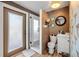 Modern bathroom with a walk-in shower, stylish fixtures, and a unique design, providing a spa-like experience at 308 Normandy Ave, New Smyrna Beach, FL 32169