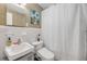 Cozy bathroom design with modern sink, toilet and shower/bath combo at 308 Normandy Ave, New Smyrna Beach, FL 32169
