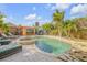 Backyard pool with jacuzzi, tiki hut and built in bar space at 308 Normandy Ave, New Smyrna Beach, FL 32169
