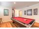 Game room with a pool table, showcasing ample space for leisure and entertainment at 3456 Pegaso Ave, New Smyrna Beach, FL 32168