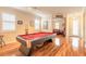 Game room featuring a pool table and a seamless transition to the office area and front entryway at 3456 Pegaso Ave, New Smyrna Beach, FL 32168
