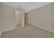 Spacious bedroom featuring a neutral color scheme, carpet, and a walk-in closet at 3546 Casalta Cir, New Smyrna Beach, FL 32168