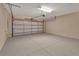A spacious garage with epoxy floors and an insulated garage door at 3546 Casalta Cir, New Smyrna Beach, FL 32168