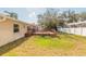 Large backyard with a wood deck and plenty of space for outdoor activities at 3626 Donna St, Port Orange, FL 32129