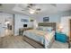 Airy bedroom with a decorative ceiling, plants, and a beachy theme, creating a relaxing atmosphere at 3728 Egret Dunes Dr, Ormond Beach, FL 32176