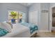 Comfortable bedroom with a large window and natural light; closet available at 3728 Egret Dunes Dr, Ormond Beach, FL 32176
