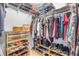 The walk-in closet with shelving and storage racks offers ample space for clothes and accessories at 3728 Egret Dunes Dr, Ormond Beach, FL 32176