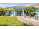 Charming home featuring a beautiful walkway and lush landscaping at 3728 Egret Dunes Dr, Ormond Beach, FL 32176