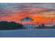 Enjoy breathtaking sunsets from this charming gazebo, a tranquil retreat by the ocean at 3728 Egret Dunes Dr, Ormond Beach, FL 32176