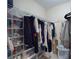 Organized closet with shelves and hanging rods, offering ample storage space for clothing and accessories at 3800 Saxon Dr # 250, New Smyrna Beach, FL 32169