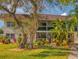 Charming multi-story condo featuring well-maintained landscaping and a cozy balcony at 3800 Saxon Dr # 250, New Smyrna Beach, FL 32169
