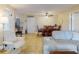 Open-concept living space showcasing a kitchen, dining area, and comfortable seating at 3800 Saxon Dr # 250, New Smyrna Beach, FL 32169
