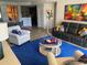 Open living area with view to kitchen and dining area at 424 Luna Bella Ln # 226, New Smyrna Beach, FL 32168