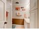Bright bathroom with a shower and decorative 'Paradise Beach' wall art at 4426 Saxon Dr, New Smyrna Beach, FL 32169