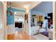 An open concept foyer between the kitchen and a Gathering room at 4426 Saxon Dr, New Smyrna Beach, FL 32169